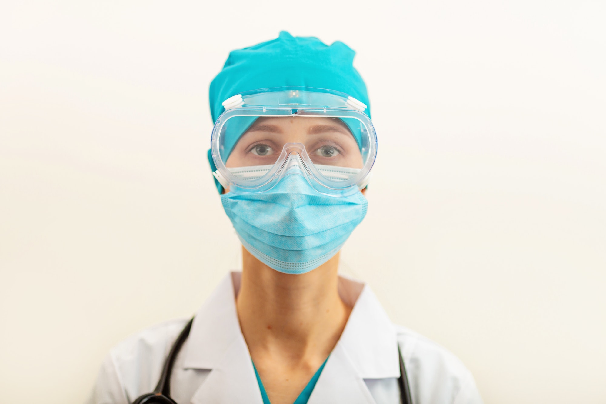 Doctor in protective face mask and glasses. Health care during coronavirus covid-19