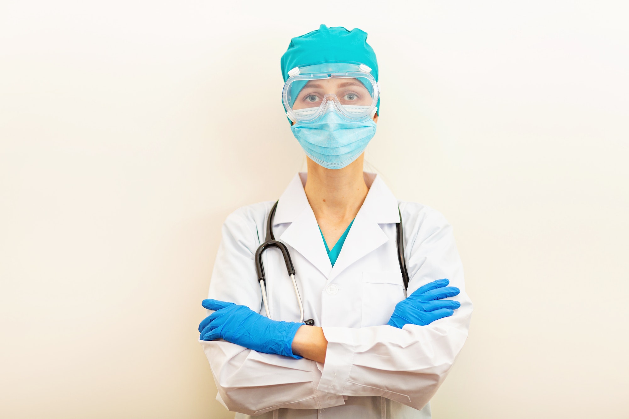 Doctor in protective face mask, glasses and gloves. Health care during coronavirus covid-19